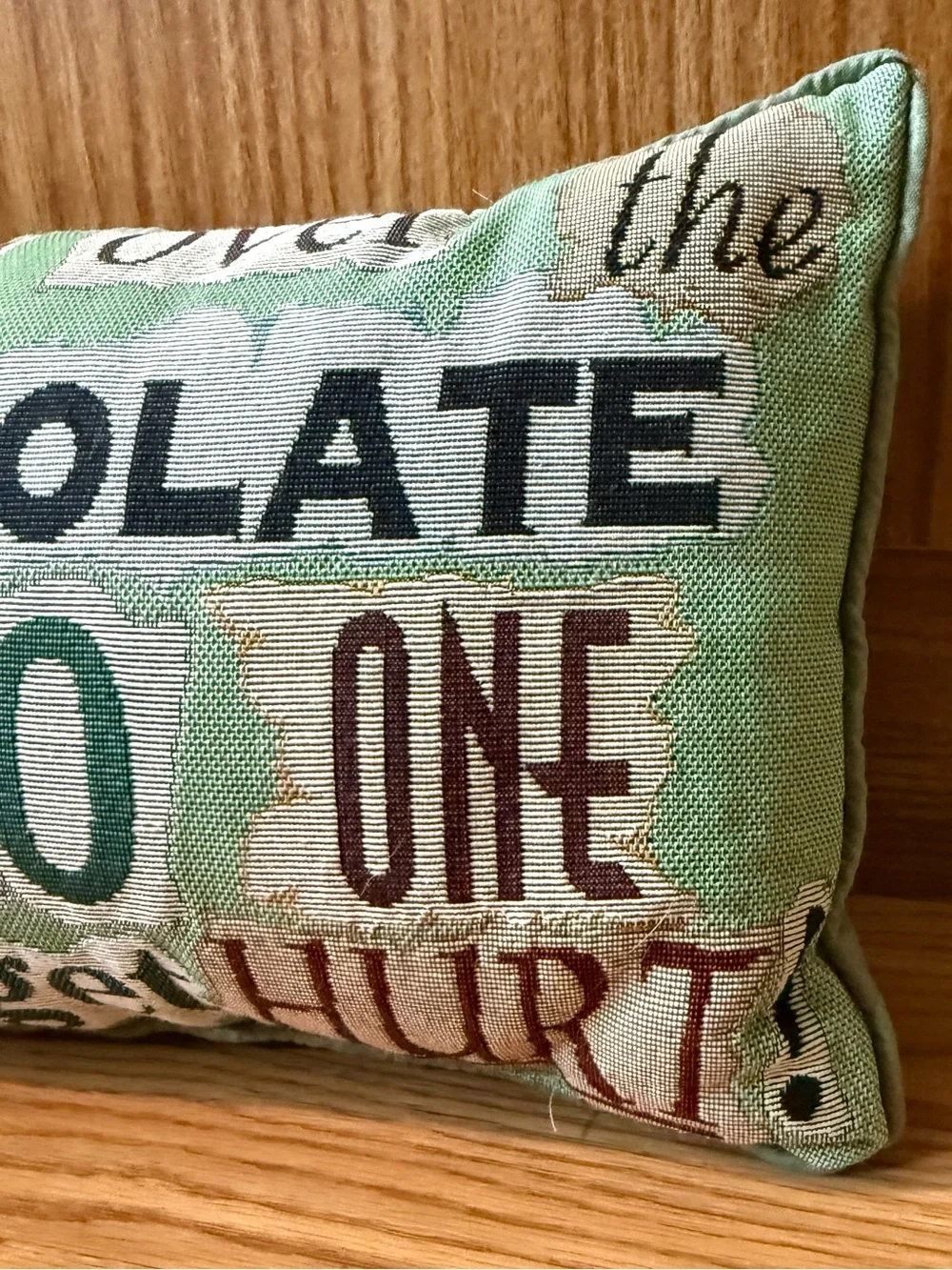 Tapestry decor pillow with phrase: HAND over the CHOCOLATE and NO ONE gets hurt